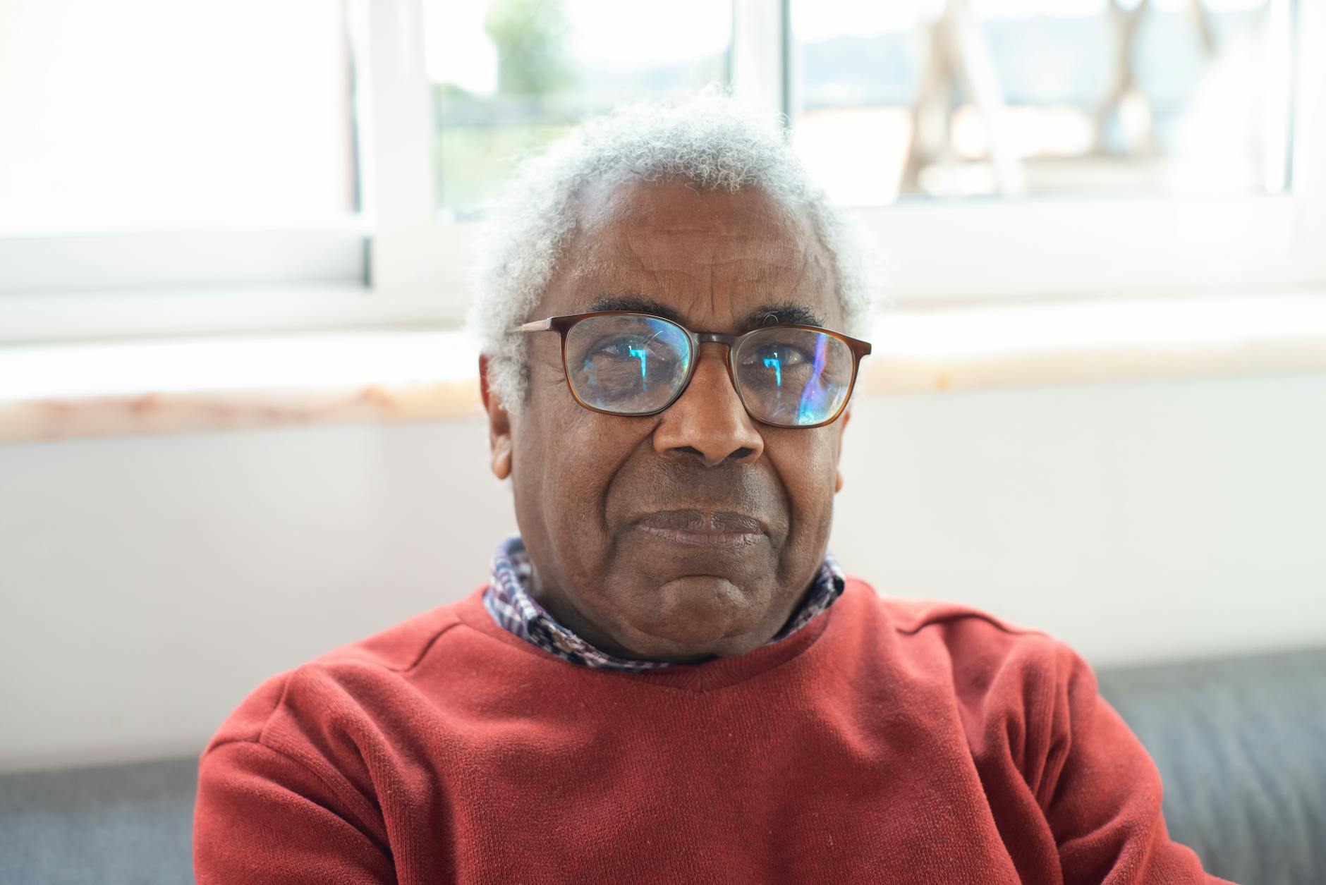 close up photograph of an elderly man with gray hair